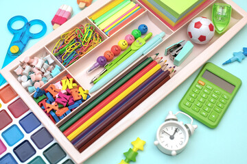 School supplies. Concept back to school. colored stationery is arranged in organizers. Creative Drawer Organizing. Storage office supplies.