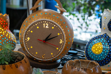 Decorative clock made of water cover.