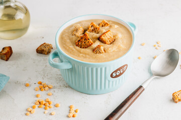 Vegan Yellow split pea soup puree with croutons