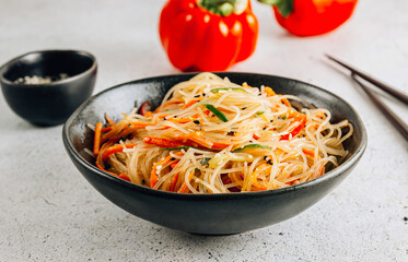 Vegan Funchoza salad. Asian salad with fresh vegetables