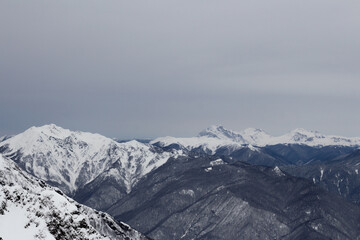 mountain view under cloudy sky
