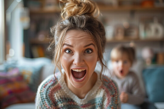 Woman Making a Funny Face Holding Baby