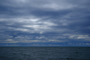 clouds over the sea. Stormy sky over the sea in the evening.