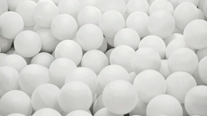 A bunch of white balls are scattered across the image
