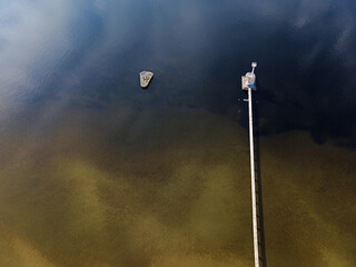 Aerial top down of Havel river Wannsee beach and Grunewald forest on a sunny day in Berlin