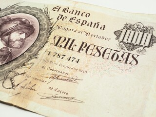 A vintage 1000 mil pesetas banknote with the image of Carlos I. Old spanish 1940 one thousand...