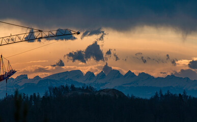 The famous mountain range Churfirsten with its seven peaks formed by erosion in the morning sunrise...