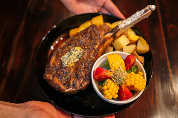 Tomahawk Cut Meat Platter with Waiter's Hand