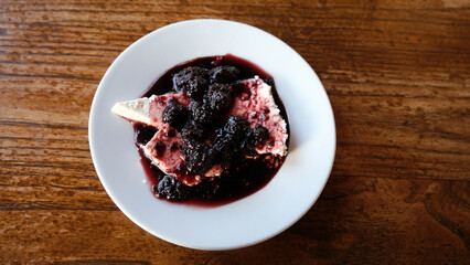 Famous traditional dessert plate in the Tire district of Izmir province in Turkey. White curd cheese with black mulberry jam