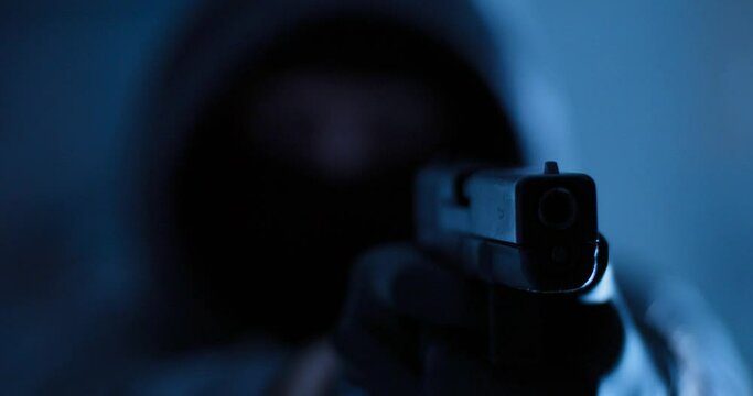 Hooded Blur Figure Fires Two Gunshots with Glock 17 in Slow Motion