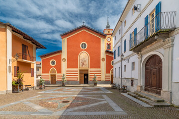 Sanfront, Cuneo, Italy - May 03, 2024: the parish church of San Martino in Piazza Ferrero paved with porphyry and stone slabs in the historic village in the Po Valley - obrazy, fototapety, plakaty