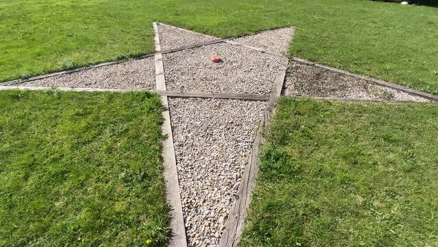 pentagram shaped symbol in lawn