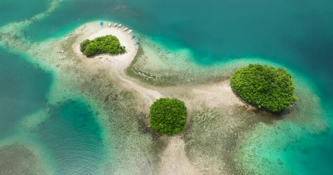 Aerial perspective of Islands with white sand beach. Britania Island. Surigao del Sur, Philippines.