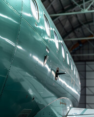 Detailed view of commercial aircraft nose and windshield. 