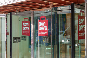 Obraz premium revolving door motion promotion for Bay Days at Hudson's Bay Department Store in downtown Toronto
