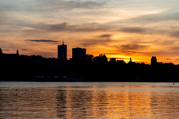 sunset against the background of silhouettes of the city of Warsaw in Poland in the spring