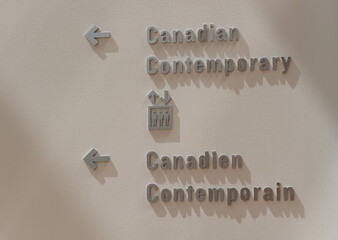 Obraz premium directions to Canadian Contemporary (and elevators) inside the Art Gallery of Ontario in Toronto