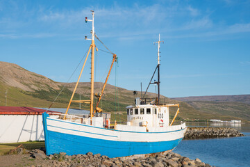 Old oak fishing boat Jon Juli on the coast of Talknafjordur in the Icelandic westfjords