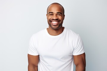 smiling man in white t-shirt