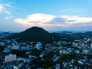 Aerial view of residential houses and driveways neighborhood during a fall sunset or sunrise time.Tightly packed homes.Top view over building houses in phuket thailand