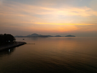 Aerial view sunset sky,Nature beautiful Light Sunset or sunrise over sea,Colorful dramatic majestic scenery sunset Sky with Amazing clouds and waves in sunset sky nature light cloud background