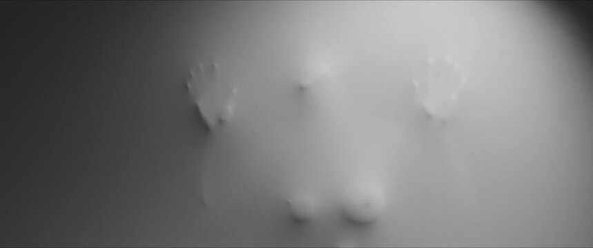 A shape of woman's body appears from the wall