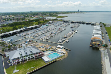 aerial shot of boats and yachts docked on the ocean water at the Southern Yacht Club with powerful...