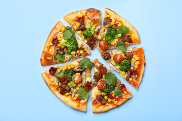 Delicious vegetarian pizza with mushrooms, vegetables and parsley on light blue background, top view