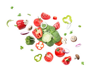 Different fresh vegetables in air on white background