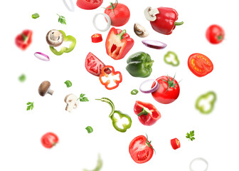 Different fresh vegetables in air on white background