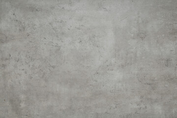 Grey concrete textured surface as background, closeup