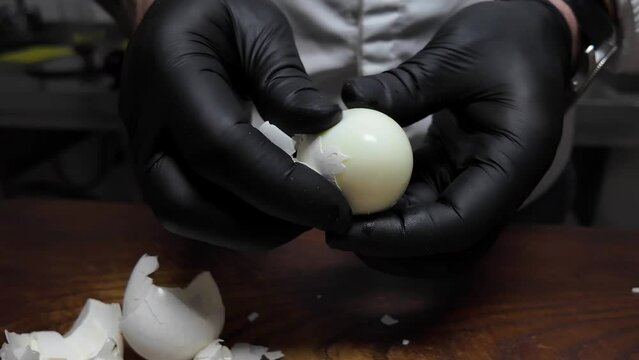 Peel boiled chicken eggs from the shell