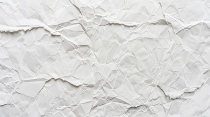 Obraz premium Artistic arrangement of torn paper on a white wall. Collage of fragments that evoke curiosity and intrigue.