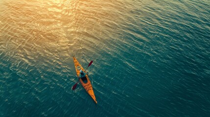Obraz premium Seafaring Solitude: Man in a Kayak, Finding Tranquility Amidst the Vast Ocean.