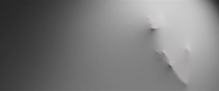 A skinny woman's face and arms extrude slowly from the wall