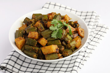 Aloo Bhindi, Potato Bhindi masala or Potato okra or lady finger fry served with Roti or Chapati or Rice ,indian food