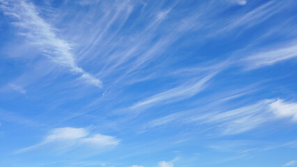 Blue sky with clouds.  .Suitable for background or sky replacement.