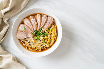 egg noodles with stewed duck in brown soup