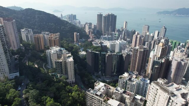 The University of Hong Kong nestles on Pok Fu Lam slopes amid Kennedy Town and Sai Ying Pun,an elite institution and global academic powerhouse