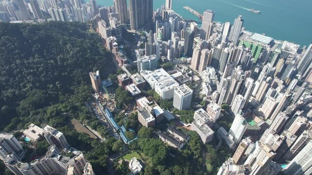 The University of Hong Kong nestles on Pok Fu Lam slopes amid Kennedy Town and Sai Ying Pun,an elite institution and global academic powerhouse