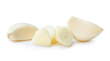 Top view of peeled garlic cloves with slices in stack isolated on white background with clipping path