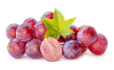 Front view of red grape or purple grapes with half and green leaf isolated on white background with clipping path