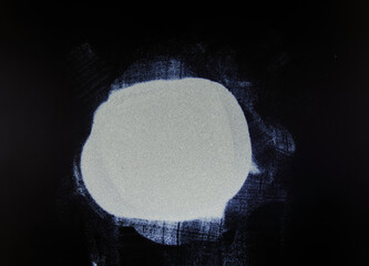 abstract white dust on a black background.