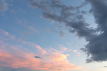 Low angle view of cloudy sky with black and orange or red color used as natural background texture in decorative art work
