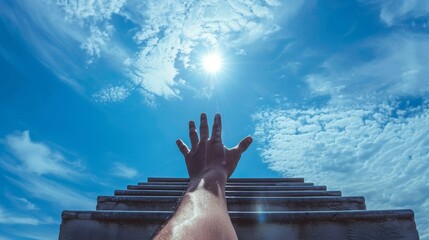 Staircase against a blue sky in the front view, with a man's hand aiming high, embodies the pursuit...