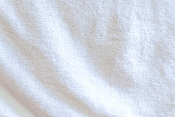 Wrinkled white towel texture with wave pattern used as clothing texture in decorative art work