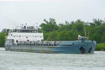 Cargo transportation by water transport. motor ships on the Volga in Volgograd.