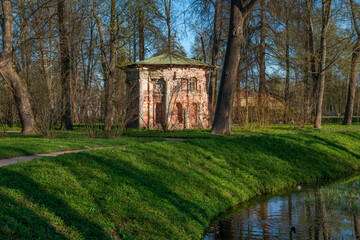 View of the kitchen-ruin pavilion in the Catherine Park of Tsarskoye Selo on a sunny spring day,...