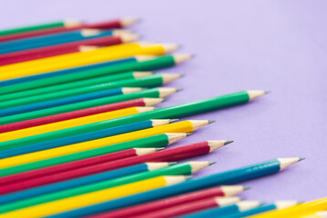 Set of multi-colored pencils background. Extreme close up view