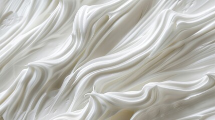 Close-up of white fabric with pleats and folds.